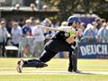 Eoin Morgan in a trademark pose as he reverse sweeps.jpg